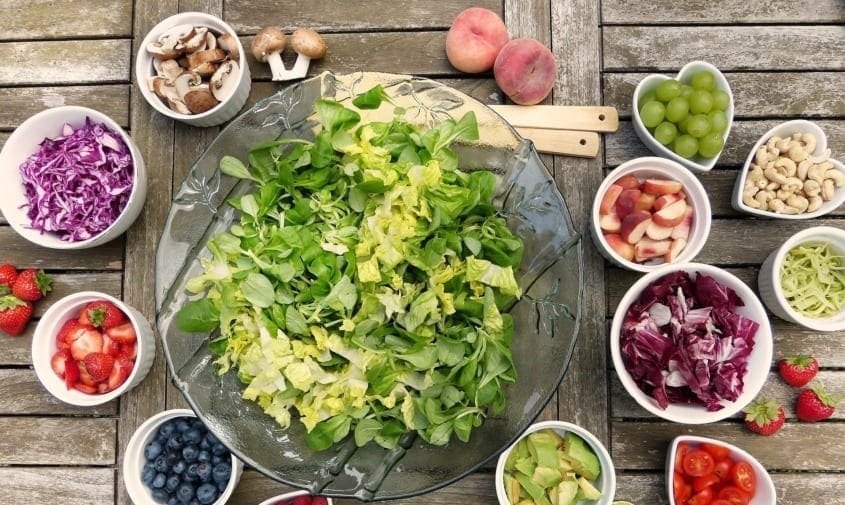 Nutritional and healthy salad options on table