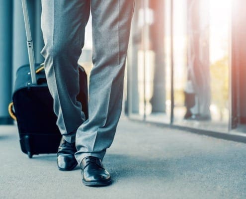 Business person showing only legs walking
